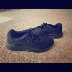 Black on Black Nike shoes